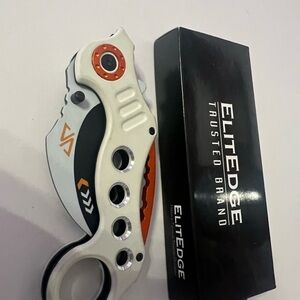 10-578WBO Elitedge white and orange karambit knife